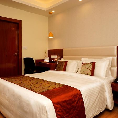 Amalfi Grand Hotel Patna  Ruang foto