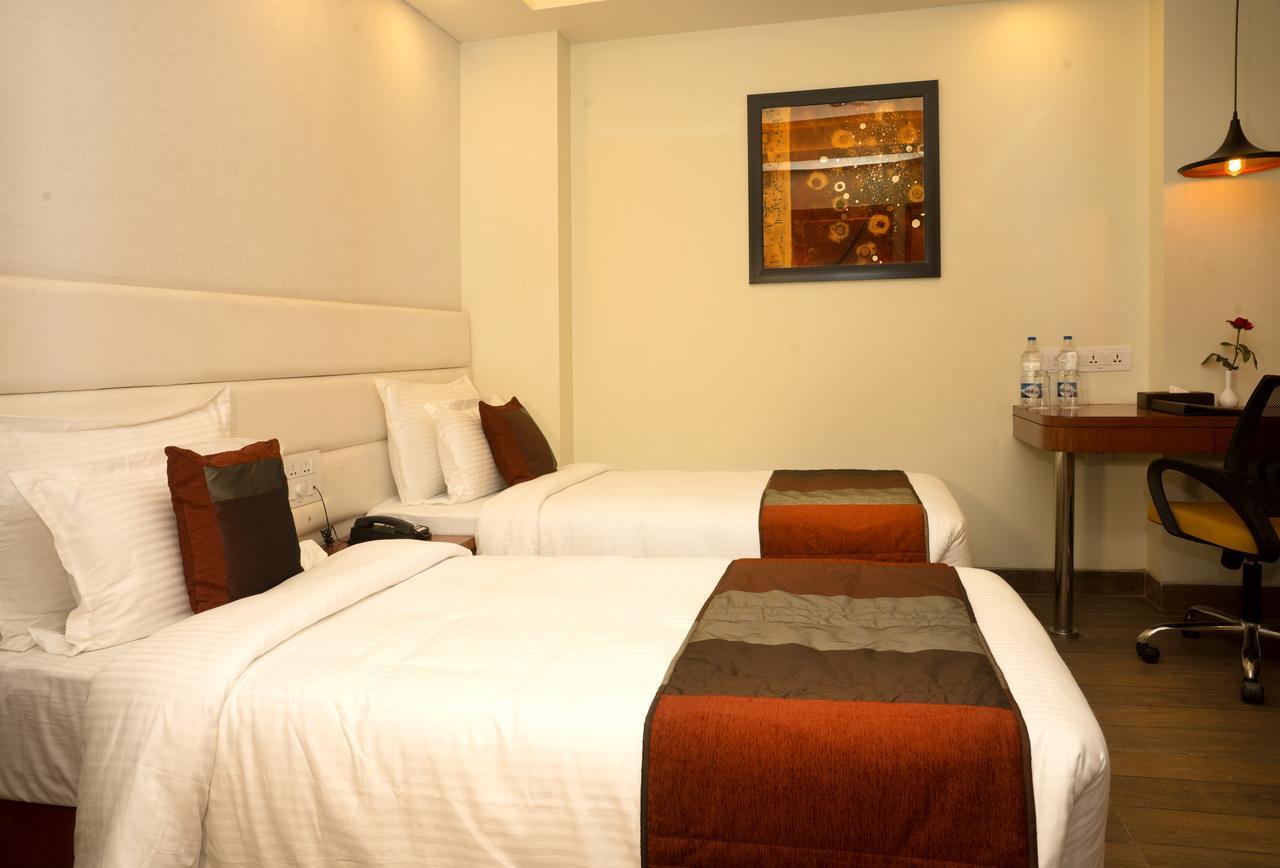 Amalfi Grand Hotel Patna  Ruang foto