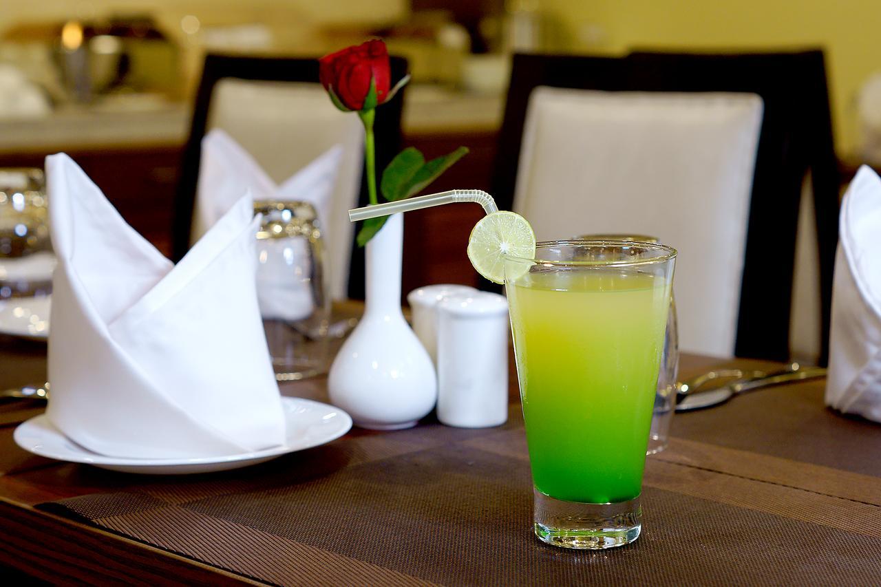 Amalfi Grand Hotel Patna  Ruang foto