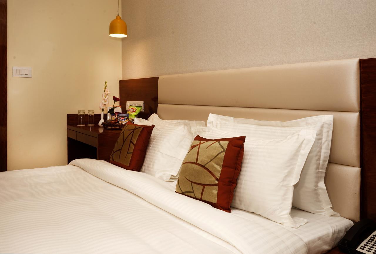 Amalfi Grand Hotel Patna  Ruang foto